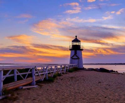 vibrant Sun rise with Brant Point Lighthouse Nantucket